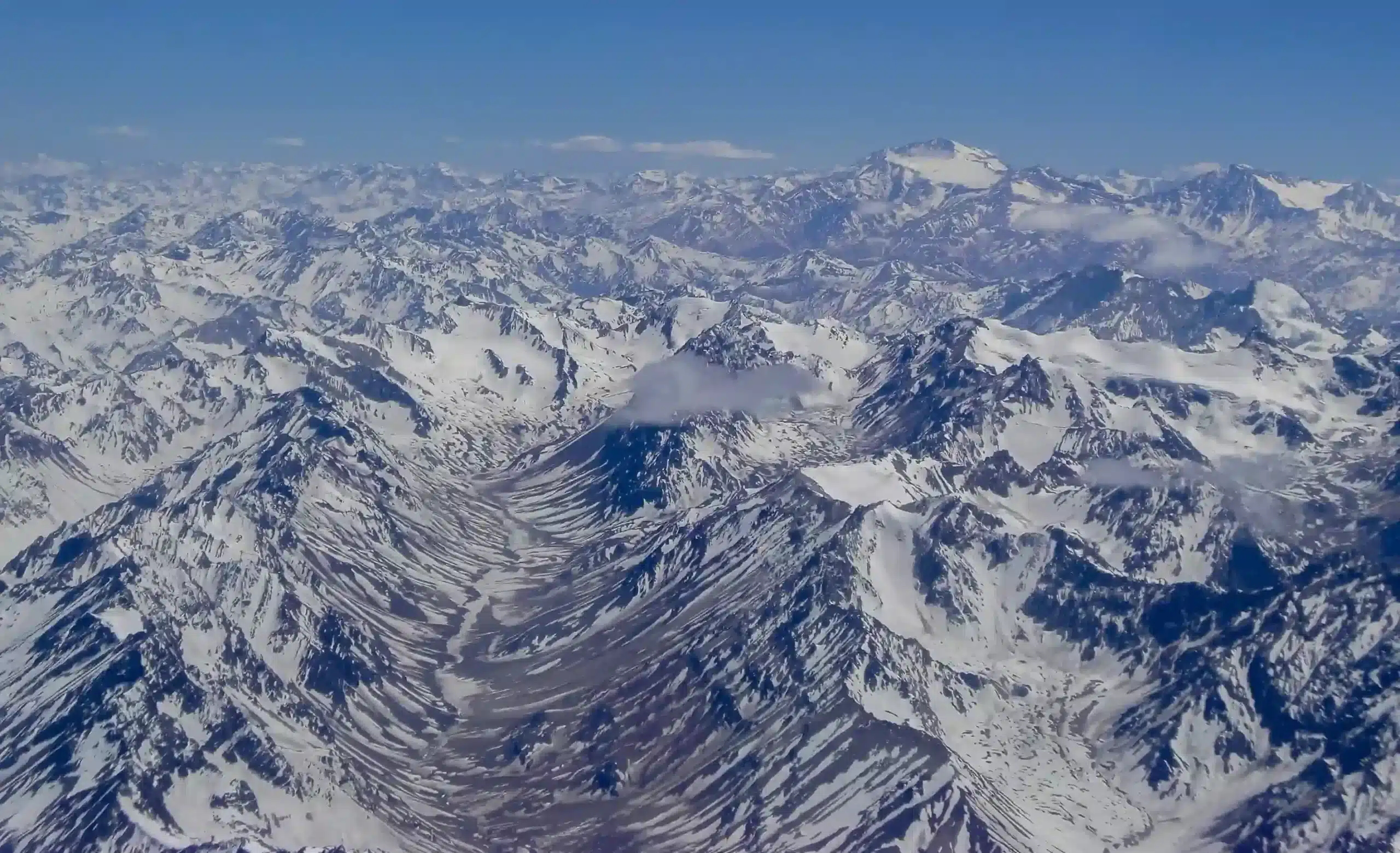 Aerial view of rugged Andean mountain ridges extending across western South America