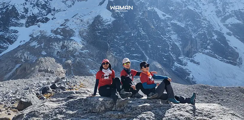 Three trekkers at the base of the Salkantay Mountain to Machu Picchu
