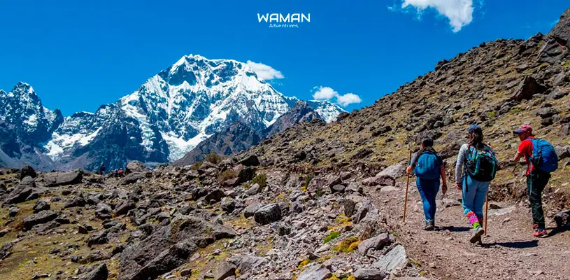 Three hikers on the Ausangate to Machu Picchu route with Waman Adventures