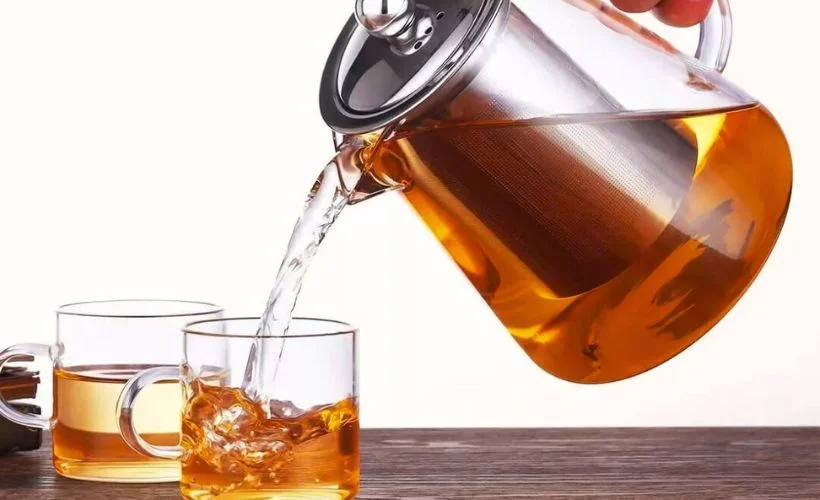 Hot Andean fruit punch made with fruit and aromatic spices in Peru