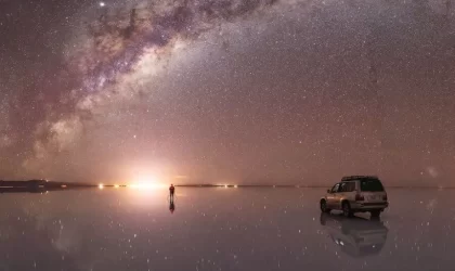 Uyuni salt flats at night: Where stars reflect on the endless salt Uyuni salt flats at night: Where stars reflect on the endless salt