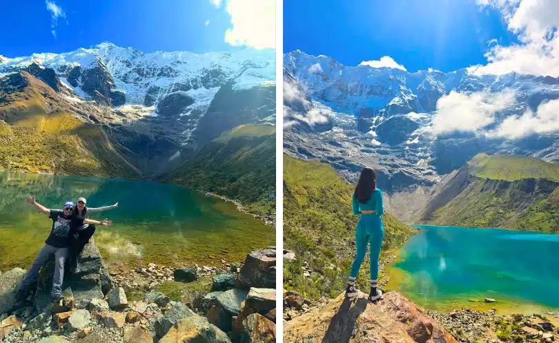Turquoise Humantay Lake in Cusco surrounded by snow-capped peaks and Andean vegetation, with travelers admiring reflections of mountains in calm glacial waters.