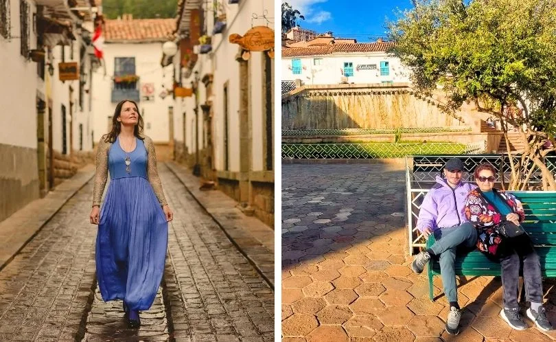 Tourists stroll along San Blas’s cobblestone lanes with white houses, blue balconies, artisan shops, and flowered windows, capturing classic Cusco neighborhood scenes in afternoon light.