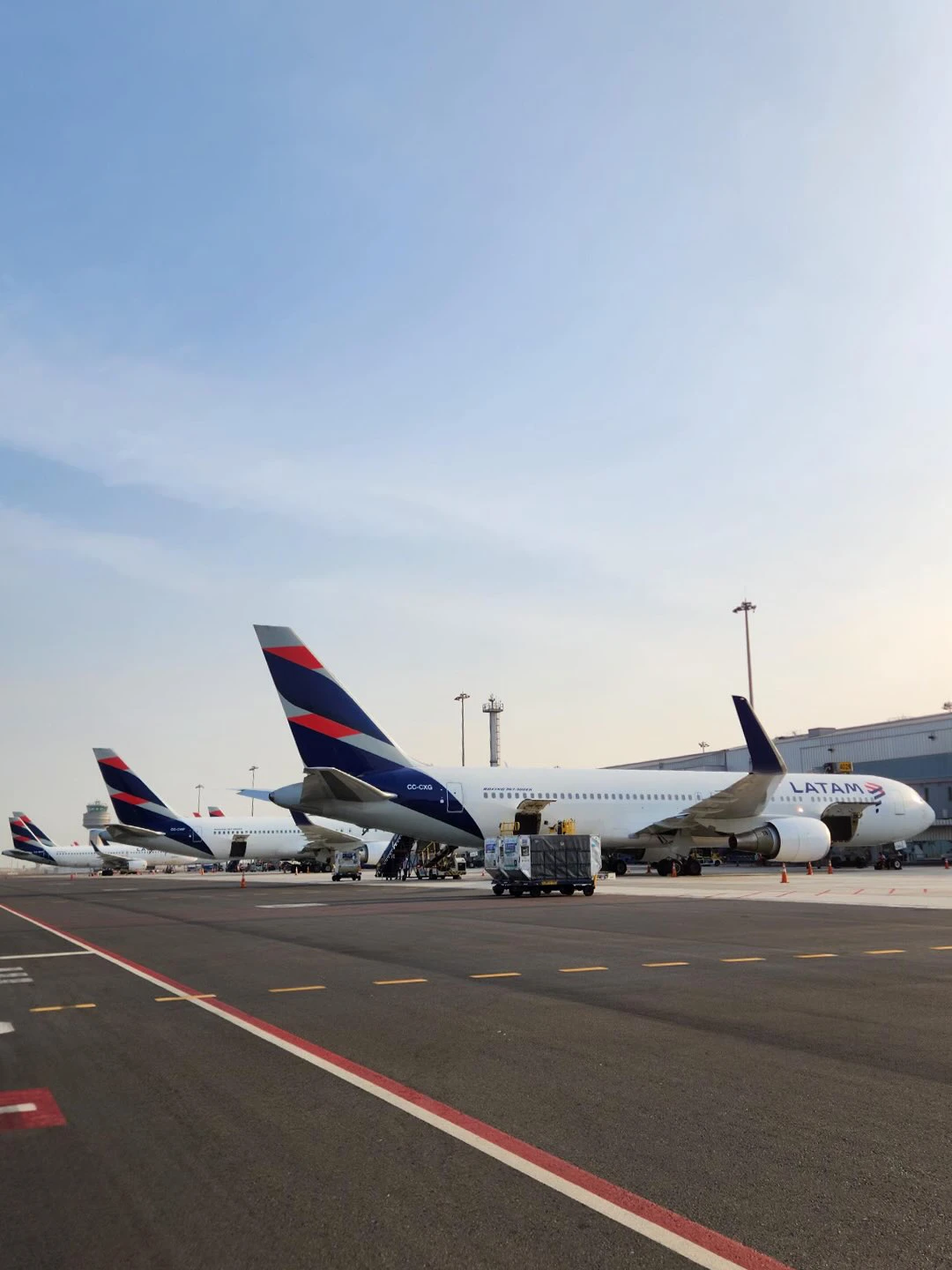 LATAM aircraft parked at gates at Jorge Chávez International Airport